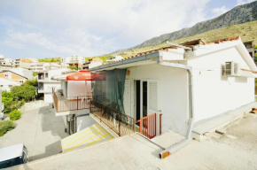 Apartments with a parking space Dugi Rat, Omis - 11483
